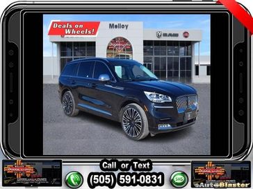 2022 Lincoln Aviator Black Label in a Black exterior color and Cashmereinterior. Melloy Dodge RAM FIAT 505-588-4459 melloydodge.com 