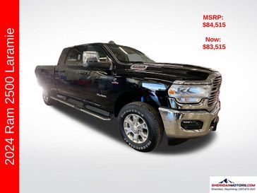 2024 RAM 2500 Laramie Mega Cab 4x4 6'4' Box in a Diamond Black Crystal Pearl Coat exterior color and Blackinterior. Sheridan Motors CDJR 307-218-2217 sheridanmotor.com 