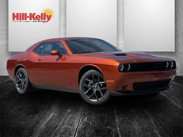 2023 Dodge Challenger SXT in a Sinamon Stick exterior color and Blackinterior. Hill-Kelly Dodge (850) 786-2130 hillkellydodge.com 