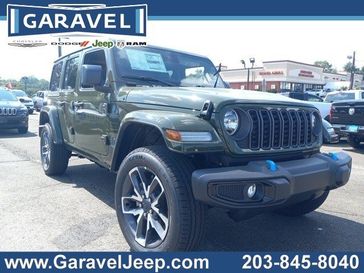 2024 Jeep Wrangler 4-door Sport S 4xe in a Sarge Green Clear Coat exterior color and Blackinterior. Garavel Jeep 475-258-7987 norwalkjeep.com 