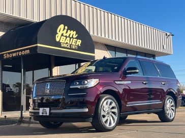 2024 Lincoln Navigator Reserve in a DIAMOND RED MET exterior color and SANDSTONEinterior. Jim Baier Inc 319-372-1012 jimbaier.com 