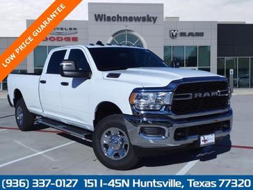 2024 RAM 2500 Tradesman Crew Cab 4x4 8' Box in a Bright White Clear Coat exterior color. Wischnewsky Dodge 936-755-5310 wischnewskydodge.com 