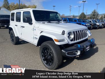 2024 Jeep Wrangler 4-door Sahara 4xe in a Bright White Clear Coat exterior color and Blackinterior. Legacy Chrysler Jeep Dodge RAM 541-663-4885 legacychryslerjeepdodgeram.com 