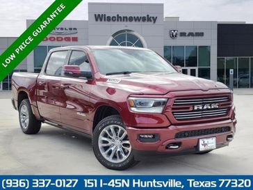 2024 RAM 1500 Laramie Crew Cab 4x4 5'7' Box in a Delmonico Red Pearl Coat exterior color and Blackinterior. Wischnewsky Dodge 936-755-5310 wischnewskydodge.com 