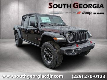 2024 Jeep Gladiator Rubicon 4x4 in a Black Clear Coat exterior color and Blackinterior. South Georgia CDJR 229-443-1466 southgeorgiacdjr.com 