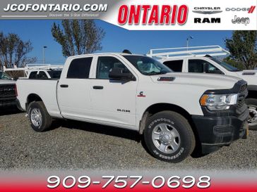 2019 RAM 2500 Tradesman in a Bright White Clear Coat exterior color and Diesel Gray/Blackinterior. Ontario Auto Center ontarioautocenter.com 