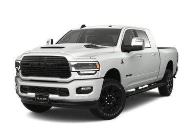 2024 RAM 2500 Laramie Mega Cab 4x4 6'4' Box in a Bright White Clear Coat exterior color. Wilmington Auto Center Chrysler Dodge Jeep Ram (937) 556-6430 wilmingtonautocentercdjr.com 