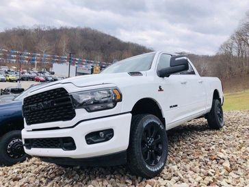2024 RAM 2500 Big Horn Crew Cab 4x4 6'4' Box in a Bright White Clear Coat exterior color and Blackinterior. Mark Porter Chrysler Dodge Jeep Ram (740) 508-5115 markportercdjr.net 