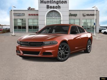 2023 Dodge Charger SXT in a Sinamon Stick exterior color and Blackinterior. BEACH BLVD OF CARS beachblvdofcars.com 