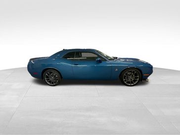 2023 Dodge Challenger R/T Scat Pack in a Frostbite exterior color and Blackinterior. Sheridan Motors CDJR 307-218-2217 sheridanmotor.com 