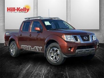 2017 Nissan Frontier PRO-4X in a Forged Copper exterior color and Beigeinterior. Hill-Kelly Dodge (850) 786-2130 hillkellydodge.com 