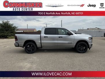 2024 RAM 1500 Laramie Crew Cab 4x4 5'7' Box in a Billet Silver Metallic Clear Coat exterior color and Blackinterior. Cornhusker Auto Center 402-866-8665 cornhuskerautocenter.com 
