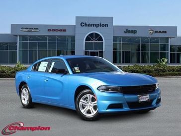 2023 Dodge Charger SXT Rwd in a B5 Blue exterior color and HOUNDSTOOTHinterior. Champion Chrysler Jeep Dodge Ram 800-549-1084 pixelmotiondemo.com 