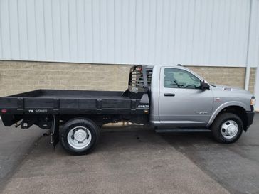 2021 RAM 3500 Chassis Tradesman 4WD Reg Cab 60 CA 143.5 WB in a Billet Silver Metallic Clear Coat exterior color and Diesel Gray/Blackinterior. Wilmington Auto Center Chrysler Dodge Jeep Ram (937) 556-6430 wilmingtonautocentercdjr.com 