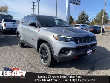 2023 Jeep Compass Trailhawk 4x4 in a Billet Silver Metallic Clear Coat exterior color and Ruby Red/Blackinterior. Legacy Chrysler Jeep Dodge RAM 541-663-4885 legacychryslerjeepdodgeram.com 