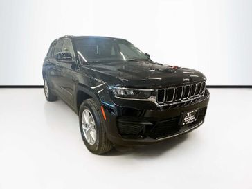 2024 Jeep Grand Cherokee Laredo X 4x4 in a Diamond Black Crystal Pearl Coat exterior color and Blackinterior. Sheridan Motors CDJR 307-218-2217 sheridanmotor.com 