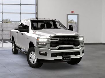 New 2026 RAM 2500 Tradesman Crew Cab 4x4 6'4' Box in a Bright White Clear Coat exterior color. Kamaaina Motors 1-808-746-7956 kamaainamotors.com 