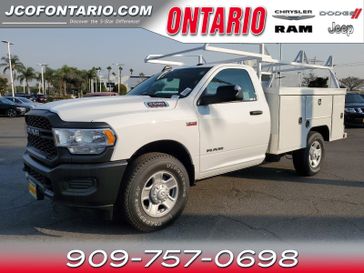 2021 RAM 2500 Tradesman in a Bright White Clear Coat exterior color and Diesel Gray/Blackinterior. Ontario Auto Center ontarioautocenter.com 
