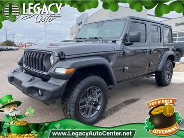 2024 Jeep Wrangler 4-door Sport S in a Granite Crystal Metallic Clear Coat exterior color and Blackinterior. Legacy Auto Center 620-315-9264 legacyautocenter.net 