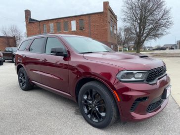 2023 Dodge Durango R T Plus in a Octane Red Pearl Coat exterior color. Hometown Motors of Rockwell City 712-220-7644 hometownmotorsrc.com 