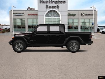 2024 Jeep Gladiator Rubicon X 4x4 in a Black Clear Coat exterior color and Black Power Adjust Nappainterior. BEACH BLVD OF CARS beachblvdofcars.com 