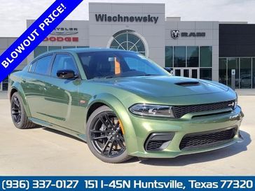 2023 Dodge Charger Scat Pack Widebody in a F8 Green exterior color and Blackinterior. Wischnewsky Dodge 936-755-5310 wischnewskydodge.com 