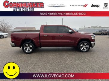 2019 RAM 1500 Laramie in a Delmonico Red Pearl Coat exterior color and Blackinterior. Cornhusker Auto Center 402-866-8665 cornhuskerautocenter.com 