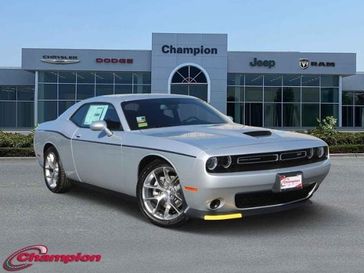 2023 Dodge Challenger Gt in a Triple Nickel exterior color and HOUNDSTOOTHinterior. Champion Chrysler Jeep Dodge Ram 800-549-1084 pixelmotiondemo.com 