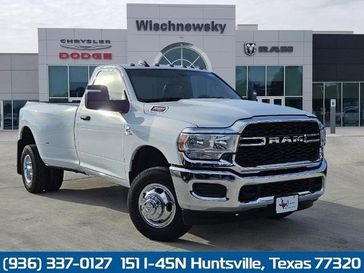 2024 RAM 3500 Tradesman Regular Cab 4x4 8' Box in a Bright White Clear Coat exterior color and Diesel Gray/Blackinterior. Wischnewsky Dodge 936-755-5310 wischnewskydodge.com 