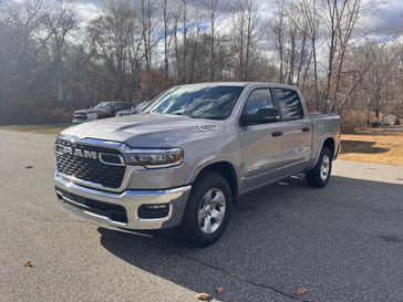 2025 RAM 1500 Big Horn in a Billet Silver Metallic Clear Coat exterior color and Blackinterior. Guzik Motor Sales Inc Jeep 413-277-7648 guzikmotor.com 