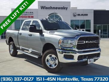 2024 RAM 2500 Tradesman Crew Cab 4x4 6'4' Box in a Billet Silver Metallic Clear Coat exterior color and Blackinterior. Wischnewsky Dodge 936-755-5310 wischnewskydodge.com 