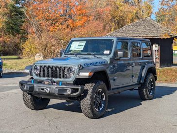 2024 Jeep Wrangler 4-door Rubicon 4xe in a Anvil Clear Coat exterior color and Blackinterior. Brattleboro CDJR 802-251-1111 brattleborocdjr.com 