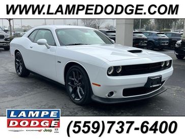 2023 Dodge Challenger R/T in a White Knuckle exterior color and Blackinterior. Lampe Chrysler Dodge Jeep RAM 559-471-3085 pixelmotiondemo.com 