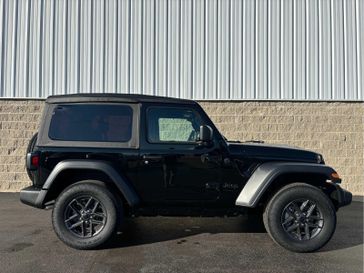 2025 Jeep Wrangler 2-door Sport S in a Black Clear Coat exterior color. Wilmington Auto Center Chrysler Dodge Jeep Ram (937) 556-6430 wilmingtonautocentercdjr.com 