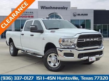 2024 RAM 2500 Tradesman Crew Cab 4x4 8' Box in a Bright White Clear Coat exterior color and Blackinterior. Wischnewsky Dodge 936-755-5310 wischnewskydodge.com 