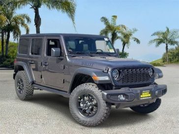 New 2026 Jeep Wrangler Willys in a Gray exterior color and Blackinterior. Southbay Chrysler Jeep Dodge Ram (424) 404-5521 pixelmotiondemo.com 