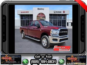 2024 RAM 3500 Tradesman Crew Cab 4x4 8' Box in a Delmonico Red Pearl Coat exterior color. Melloy Dodge RAM FIAT 505-588-4459 melloydodge.com 