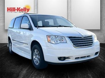 2009 Chrysler Town & Country Touring in a Stone White Clear Coat/Black Cloth Top exterior color and Medium Slate Gray/Light Shaleinterior. Hill-Kelly Dodge (850) 786-2130 hillkellydodge.com 