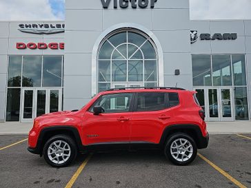 2023 Jeep Renegade Latitude 4x4 in a Colorado Red Clear Coat exterior color and Blackinterior. Victor Chrysler Dodge Jeep Ram 585-236-4391 victorcdjr.com 