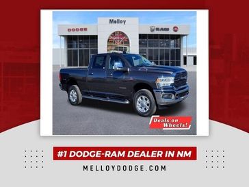 2024 RAM 2500 Laramie Crew Cab 4x4 6'4' Box in a Granite Crystal Metallic Clear Coat exterior color and Blackinterior. Melloy Dodge RAM FIAT 505-588-4459 melloydodge.com 