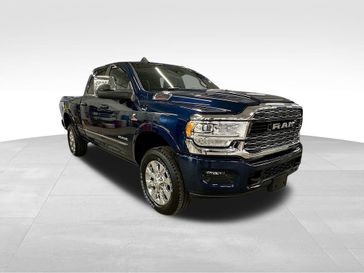 2024 RAM 2500 Limited Crew Cab 4x4 6'4' Box in a Patriot Blue Pearl Coat exterior color and Blackinterior. Sheridan Motors CDJR 307-218-2217 sheridanmotor.com 