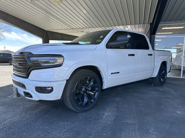 2024 RAM 1500 Limited Crew Cab 4x4 5'7' Box in a Ivory White Tri Coat Pearl Coat exterior color. Shields Motor Company Inc (620) 902-2035 shieldsmotorchryslerdodgejeep.com 