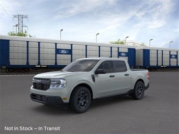 2024 Ford Maverick XLT in a Cactus Gray exterior color and Navy Pier Med Slate Triminterior. Ontario Auto Center ontarioautocenter.com 