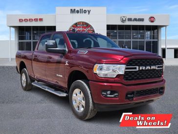 2024 RAM 2500 Big Horn Crew Cab 4x4 6'4' Box in a Delmonico Red Pearl Coat exterior color. Melloy Dodge RAM FIAT 505-588-4459 melloydodge.com 