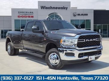 2024 RAM 3500 Big Horn Crew Cab 4x4 8' Box in a Granite Crystal Metallic Clear Coat exterior color and Diesel Gray/Blackinterior. Wischnewsky Dodge 936-755-5310 wischnewskydodge.com 