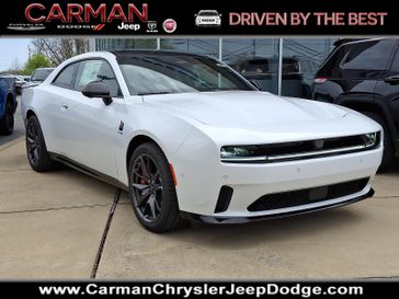2024 Dodge 2 Door Scat Pack Awd  in a White Knuckle Clear Coat exterior color. Carman Chrysler Jeep Dodge Ram 302-317-2378 carmanchryslerjeepdodge.com 