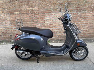 2023 Vespa Primavera Touring 150   in a Grigio Travolgente exterior color. Motoworks Chicago 312-738-4269 motoworkschicago.com 