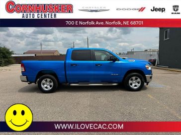 2023 RAM 1500 Big Horn Crew Cab 4x4 5'7' Box in a Hydro Blue Pearl Coat exterior color and Blackinterior. Cornhusker Auto Center 402-866-8665 cornhuskerautocenter.com 