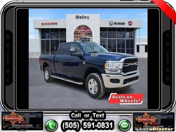 2024 RAM 3500 Tradesman Crew Cab 4x4 6'4' Box in a Patriot Blue Pearl Coat exterior color and Blackinterior. Melloy Dodge RAM FIAT 505-588-4459 melloydodge.com 