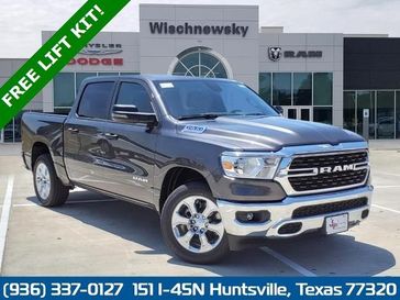 2023 RAM 1500 Lone Star Crew Cab 4x4 5'7' Box in a Granite Crystal Metallic Clear Coat exterior color and Diesel Gray/Blackinterior. Wischnewsky Dodge 936-755-5310 wischnewskydodge.com 